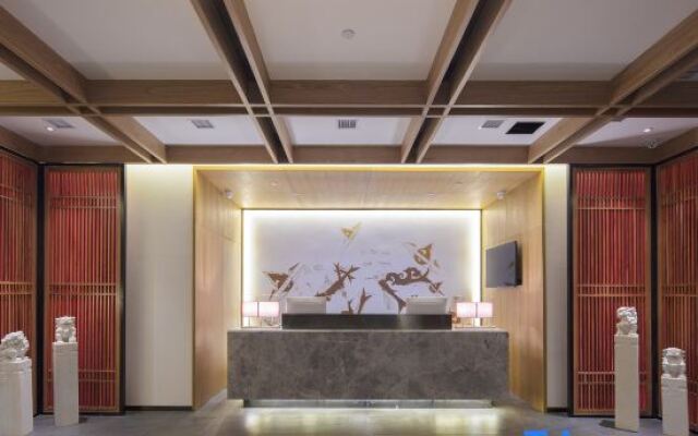 QIANNA HOTEL (Xinxiang Hualan Avenue Pangdonglai Shopping Plaza)