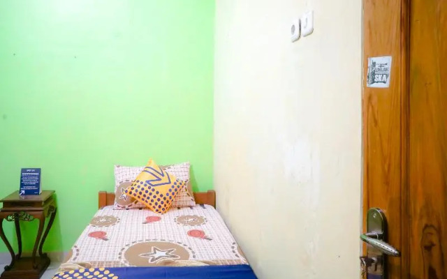 Wallet Family Residence Syariah by OYO Rooms