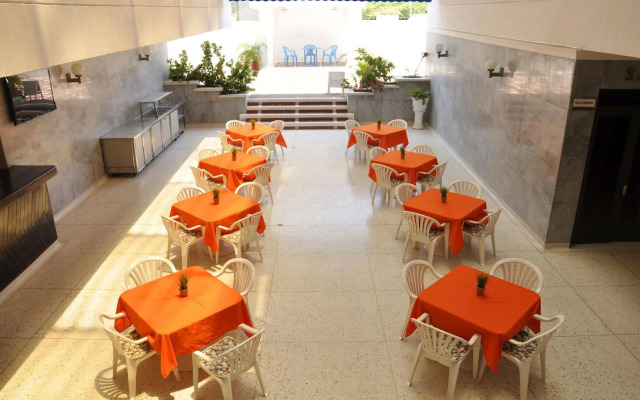 Axis Inn by GEH Suites Hotel