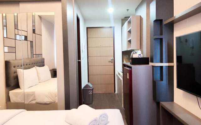 Nice And Elegant Studio At Vida View Makassar Apartment