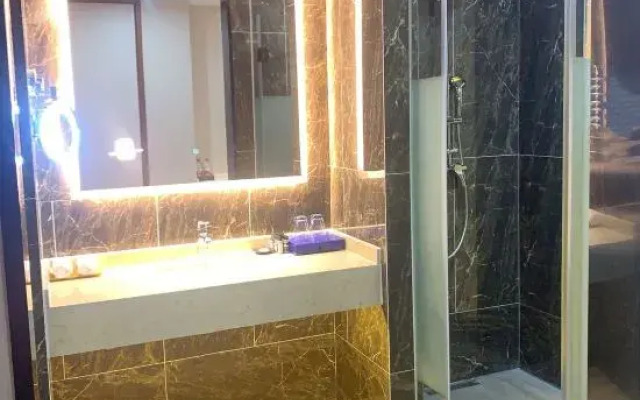 Chaoman Hotel (Suining Gymnasium Wanda Branch)