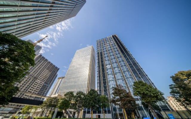 Burris Executive Apartment (Shenzhen Coast City Nanyou Clothing Store)