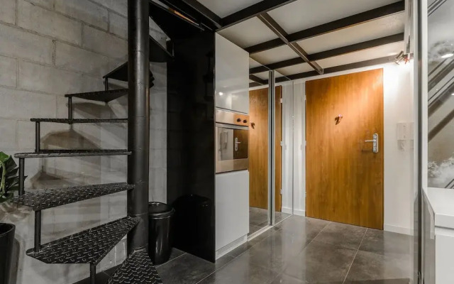 Dwupoziomowy loft w Tobaco Park