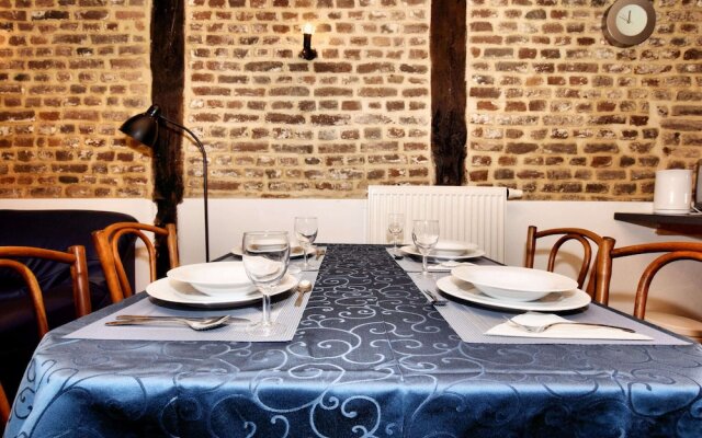 Nice Apartments in a Monumental Square Farm