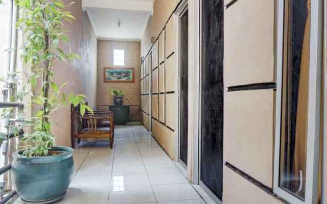 SPOT ON 90146 Sugianto Guesthouse Syariah