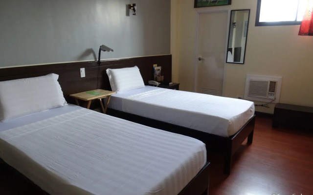 RueMango Apartelle and Suites