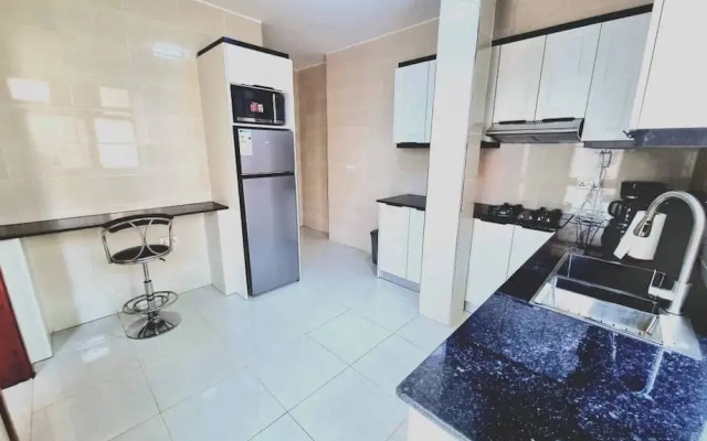 Q-Plus Apartments