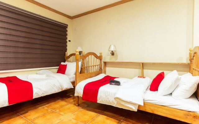 Brickwood Suites by RedDoorz