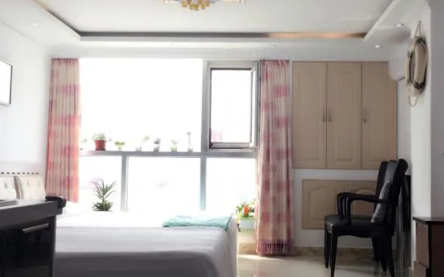 Kaixuan Shidai Family Apartment