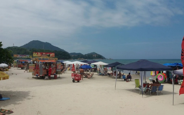 Apto 22E ar condicionado e ventilador, 2 quartos, churrasqueira, elevador e piscina