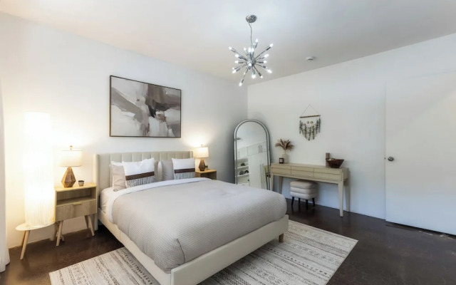 Stylish Hillside Retreat with Pool & Views