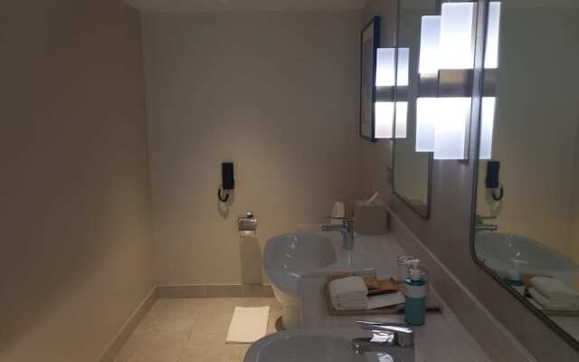 Capital O 950 Acqua Novotel Tower