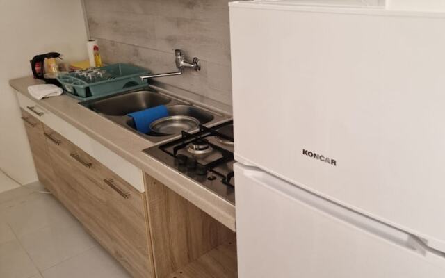 Four Bedroom apt w Patio Close to Beach and Center