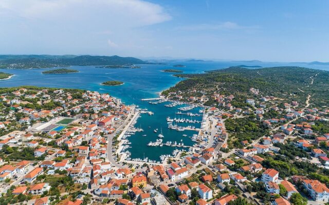 Awesome Home in Jezera with Hot Tub, WiFi & 1 Bedrooms