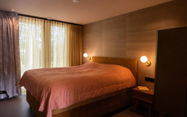 Bungalow met jacuzzi en grote tuin