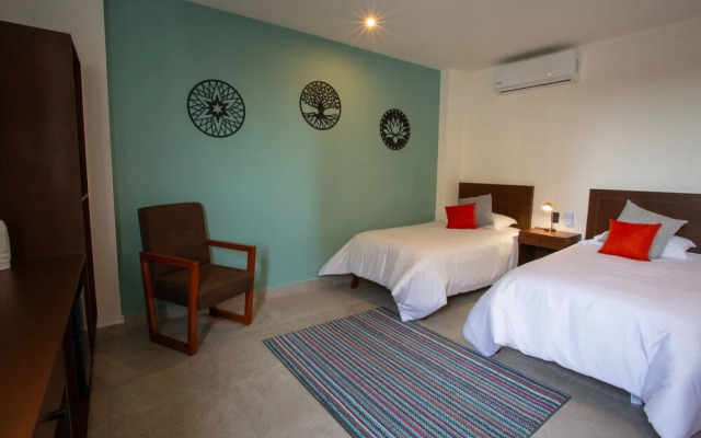 ESDUMA MURá CANCúN