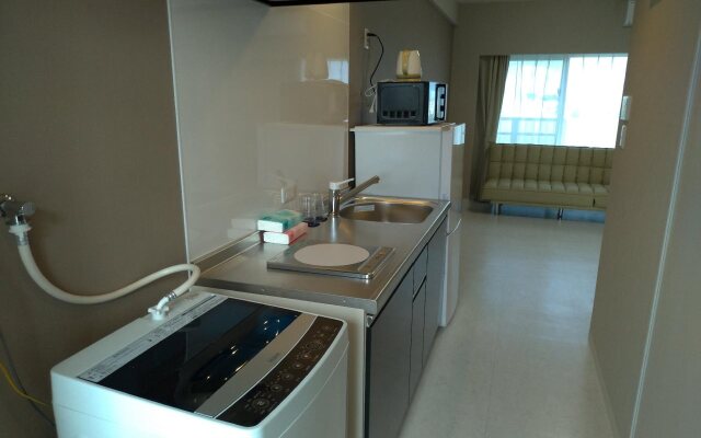 Mr.KINJO inn in front of Children Medical Care Center