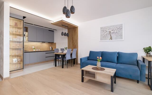 Dark Blue Apartment in Kraków by Renters