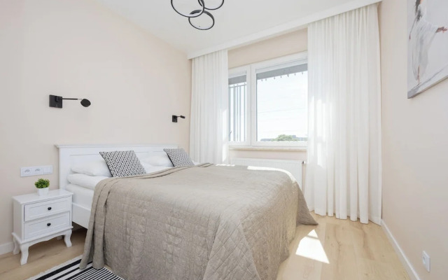 Gumińska Apartment Warsaw by Renters