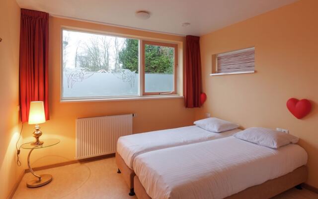 Cozy decorated house with fireplace, surrounded by forest