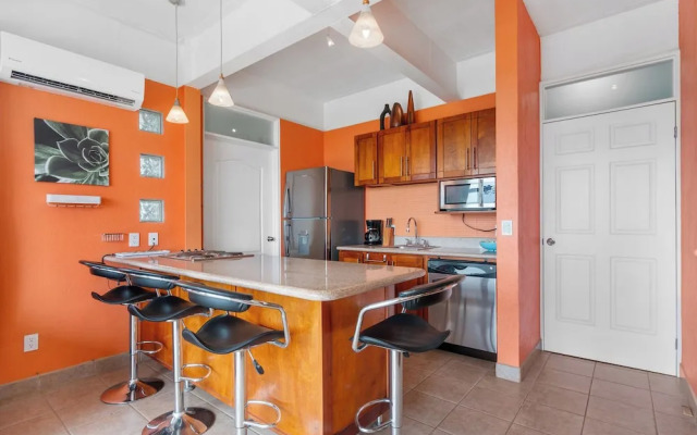 Modern Top-Floor Condo with Panoramic Views and Community Pool