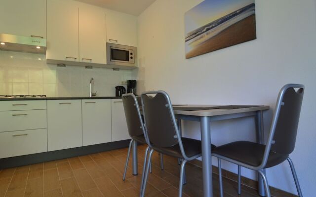 Apartment in Nieuwvliet with Roof Terrace, Garden, Parking