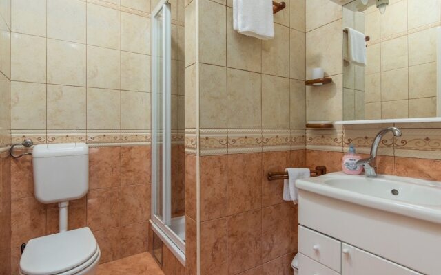 Newly built stone villa Mia with garden and pool