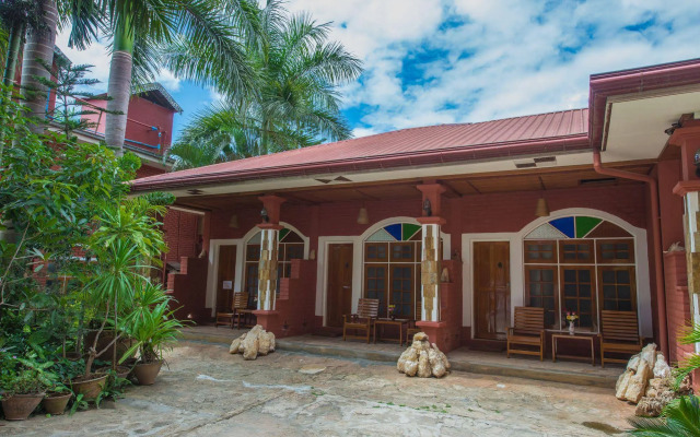Teak Wood Hotel