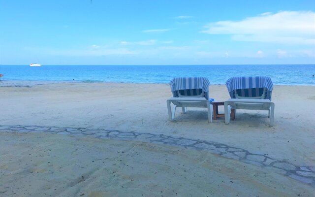 CocoLaPalm Seaside Resort