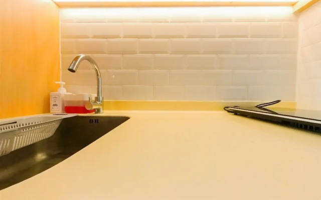 Homey And Modern Studio At Tree Park City Cikokol Apartment