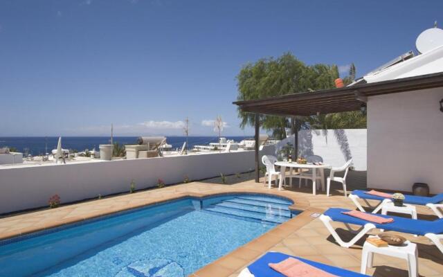 2 bedroom villa 'The Bungalow' with private heated pool.