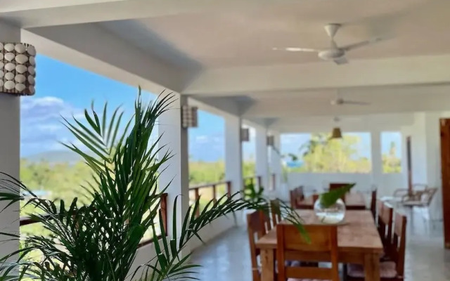 Casa flor vista al mar