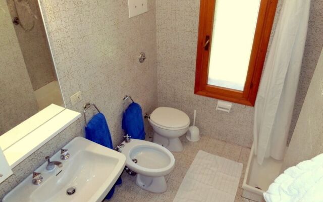 Lignano Riviera con 3 camere e giardino