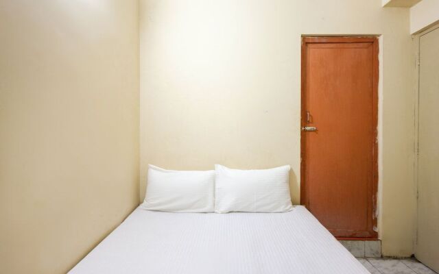 Spot On 60491 Harini Lodge