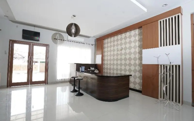 Capital O 1974 Grand Parigi Hotel