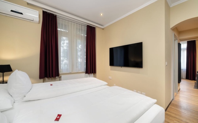 Swiss Inn & Apartments – Guest Rooms – Interlaken