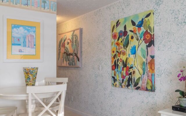 Sun Kissed Beachside Condo With Pool