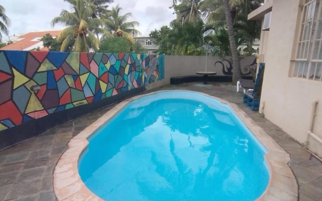 Apartment With one Bedroom in Trou-aux-biches, With Shared Pool, Furnished Terrace and Wifi - 1 km From the Beach