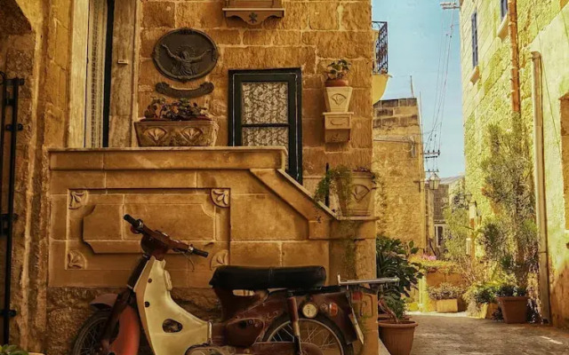 A Pretty Duplex Apartment in a Gozo Village Square