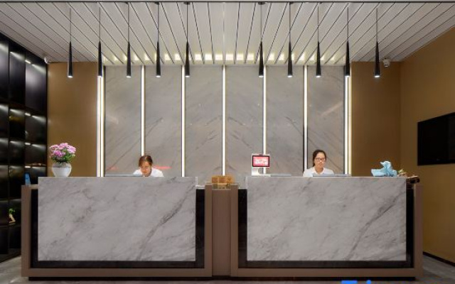 Ofis Meiji Hotel (Huzhou Xiaoxi Street Yishang Street)