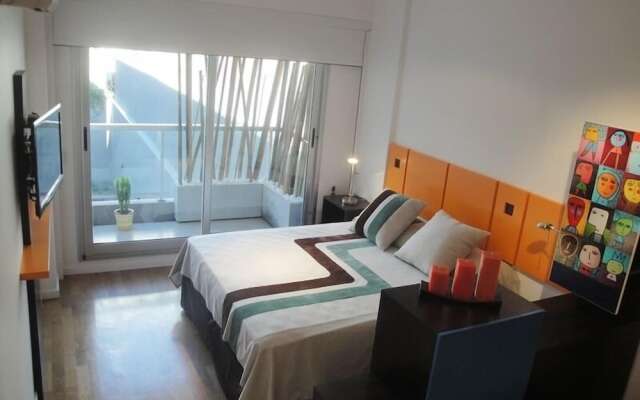 Gold Soho Suites y Studios