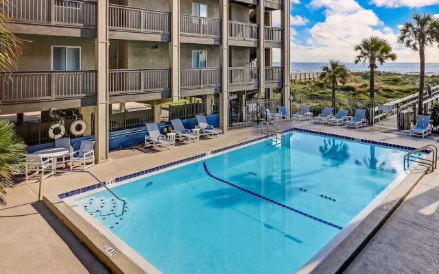 Newly Remodeled Oceanfront Condo with Salt Water Pool and Private Walkway to Beach by RedAwning