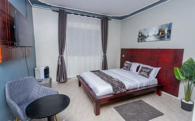 The Den Soroti White