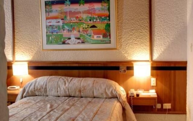 Suites Real 85