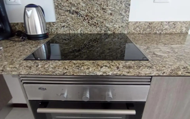 Hermoso departamento con piscina y estacionamiento