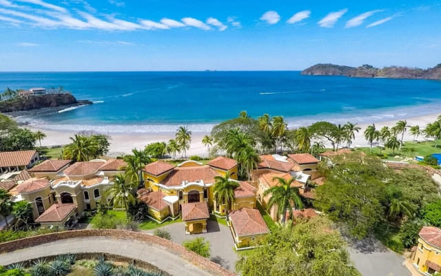 Mediterranean-style Flamingo Mansion Offers the Ultimate in Beachfront Luxury