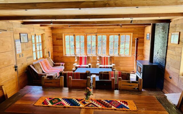 Cabañas entre montañas con tinajas calientes