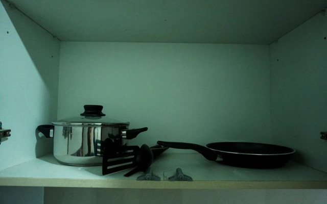 Modern with City View @ Studio Puri Mansion Apartment By Travelio