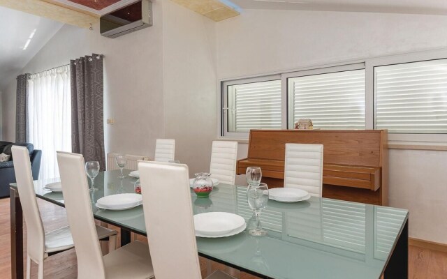 Nice Home in Kastel Novi With Sauna, Wifi and 8 Bedrooms