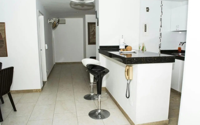 Apartamento con playa privada y piscina